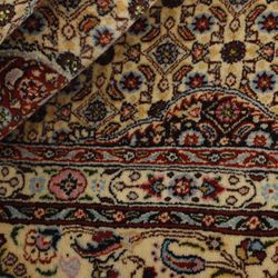 Moud Mahi gulvt&aelig;ppe, Rezas