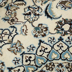 Nain 9 gulvt&aelig;ppe, Rezas